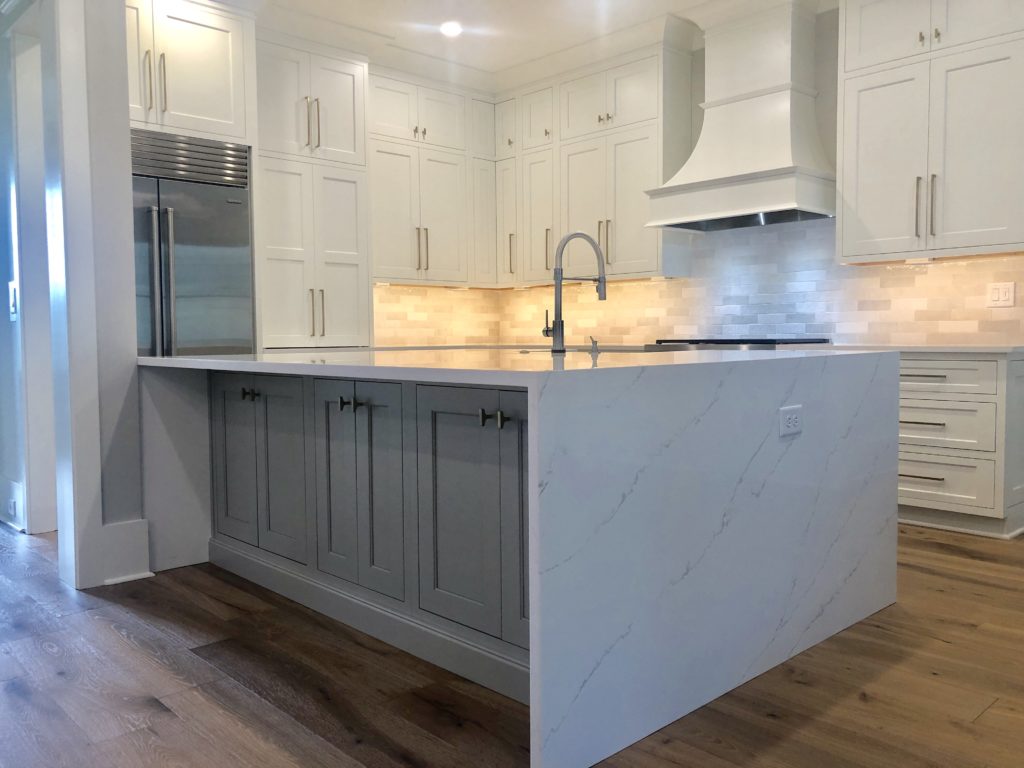 White Kitchen With Waterfall Island - Dalton Carpet OneDalton Carpet One